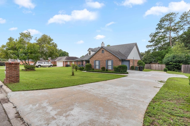 1989 Setting Sun Trl, Tallahassee, FL 32303 - traditional-style house featuring brick siding, driveway, a garage, and a chimney