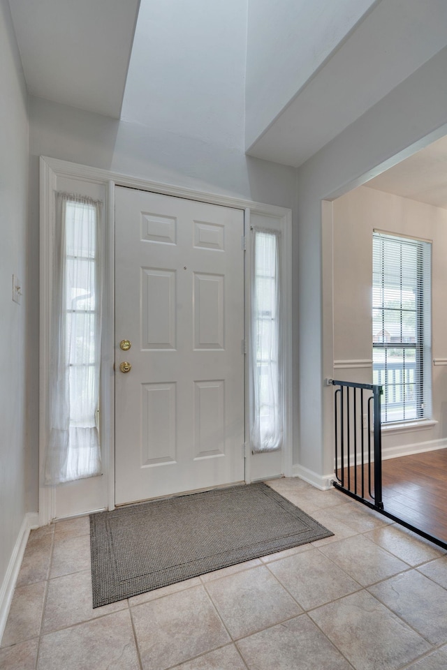 1989 Setting Sun Trl, Tallahassee, FL 32303 - foyer with baseboards and light tile patterned floors