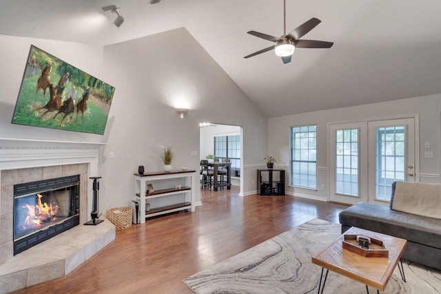 1989 Setting Sun Trl, Tallahassee, FL 32303 - living area featuring wood finished floors, a fireplace, high vaulted ceiling, and a ceiling fan