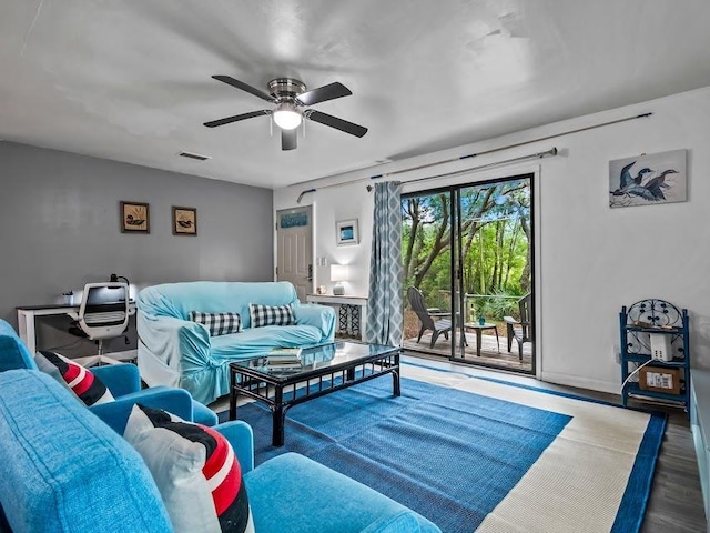 12 Lake Essay Dr, Panacea, FL 32346 - living room featuring ceiling fan, wood finished floors, and baseboards