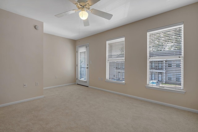2400 Fred Smith Rd Unit 202, Tallahassee, FL 32303 - empty room with light carpet and a ceiling fan