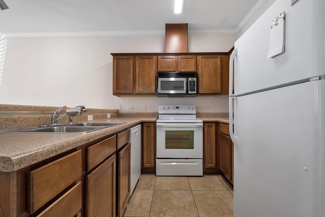 kitchen with white appliances, sink, light tile patterned flooring, and crown molding