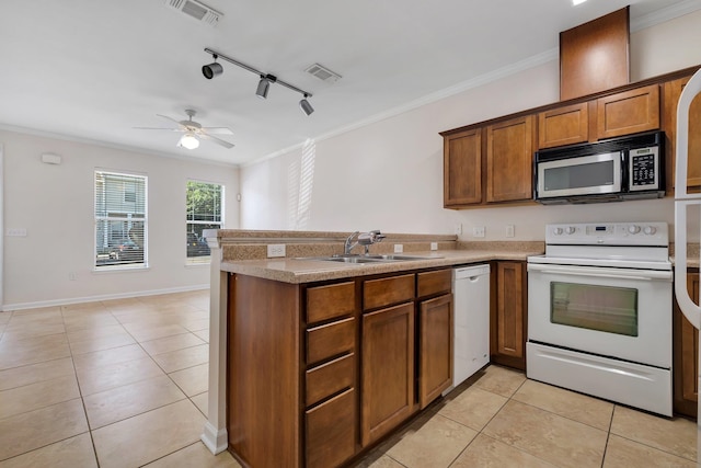 kitchen featuring ornamental molding, white appliances, light tile patterned floors, rail lighting, and kitchen peninsula