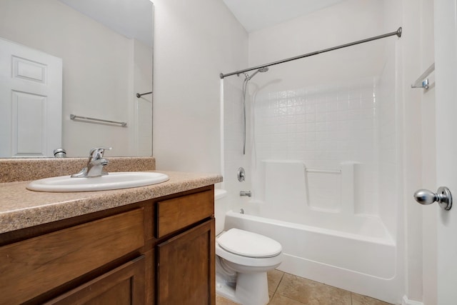 full bathroom with toilet, tub / shower combination, vanity, and tile patterned flooring