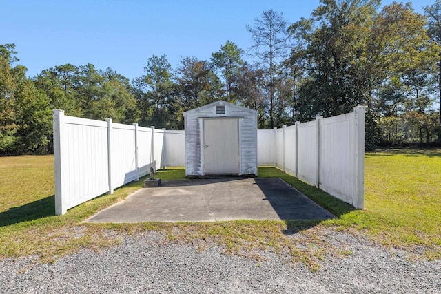 view of shed featuring a fenced backyard