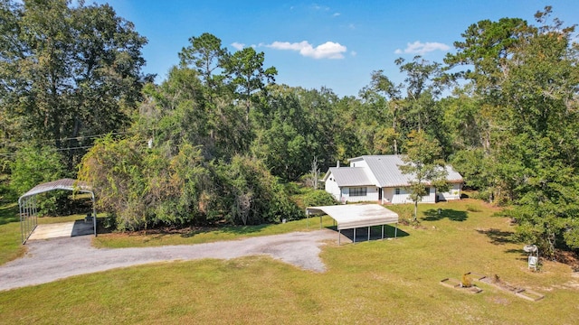 aerial view featuring a wooded view