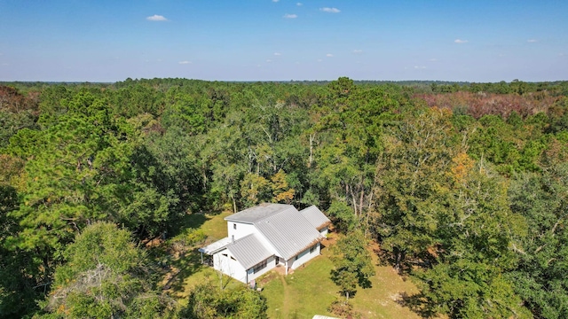 drone / aerial view with a view of trees