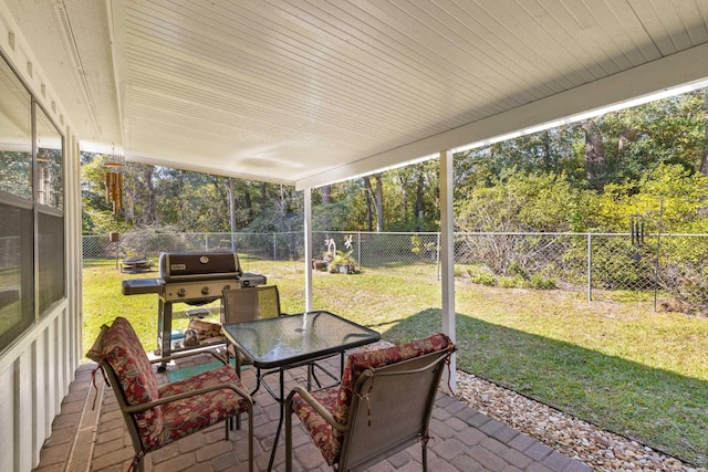 sunroom / solarium with outdoor dining area