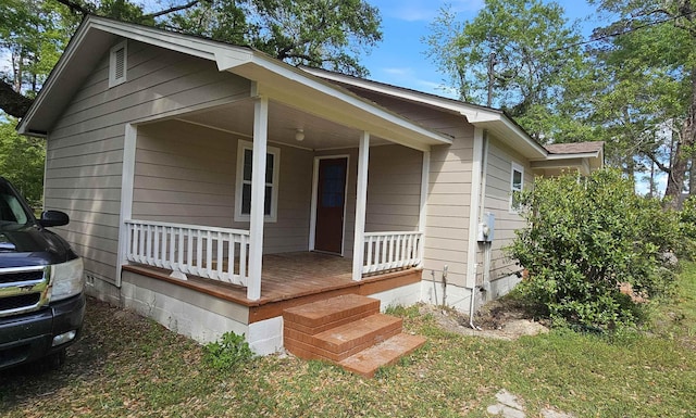 bungalow-style home with a porch