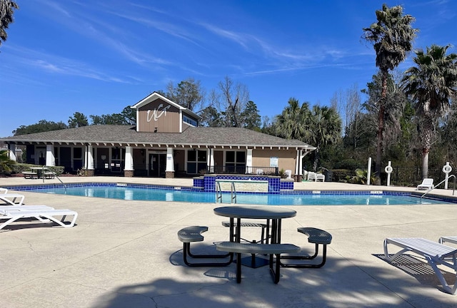 community pool with a patio