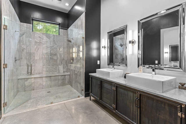 719 Middlebrooks Cir, Tallahassee, FL 32312 - full bath with a stall shower, double vanity, and concrete floors