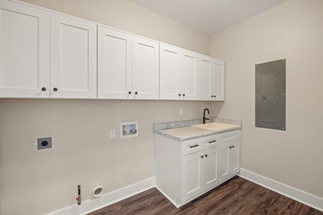 clothes washing area with hookup for an electric dryer, washer hookup, sink, electric panel, and hookup for a gas dryer