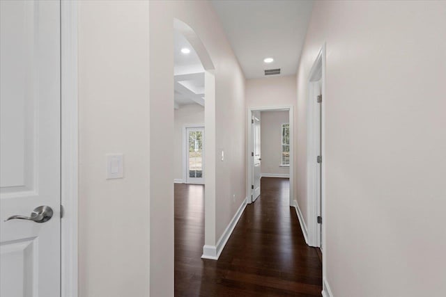 corridor featuring dark wood-type flooring