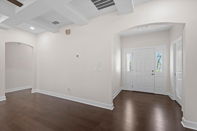 entryway featuring coffered ceiling, beam ceiling, and dark wood-type flooring