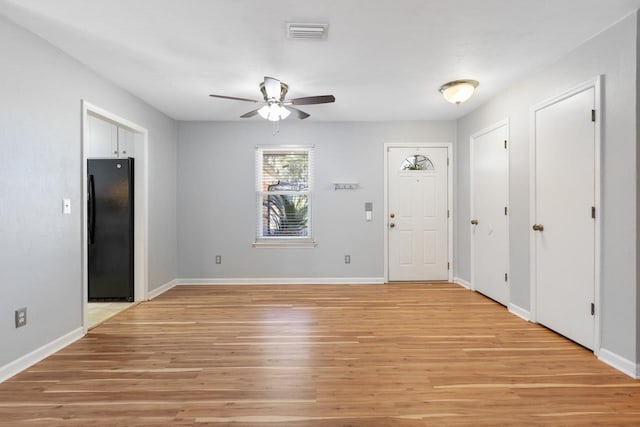 entryway featuring ceiling fan and light wood-type flooring