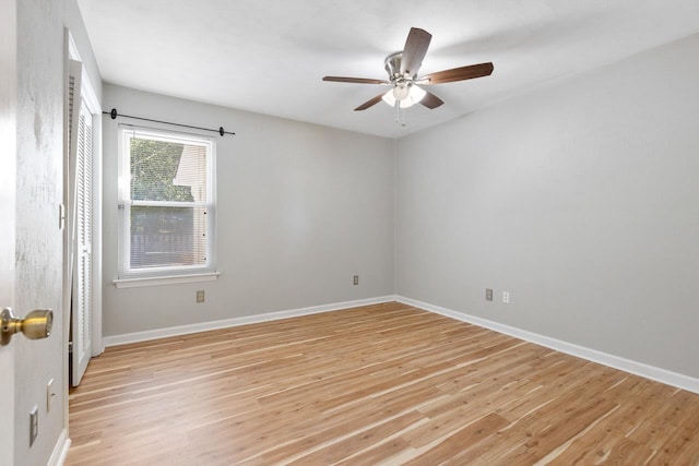 unfurnished room featuring light hardwood / wood-style flooring and ceiling fan