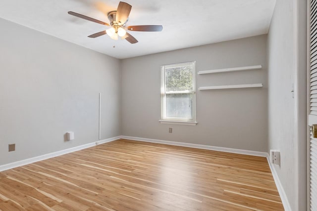 empty room featuring ceiling fan and wood-type flooring