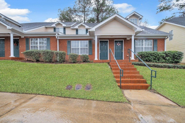 view of front of house with a front lawn