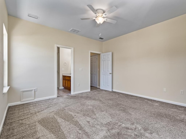 325 Chastain Ln, Tallahassee, FL 32305 - unfurnished bedroom with light carpet, baseboards, and visible vents