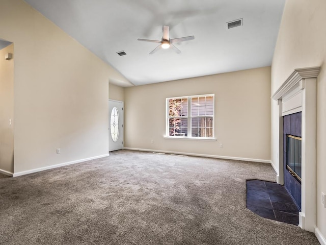 325 Chastain Ln, Tallahassee, FL 32305 - unfurnished living room with a tiled fireplace, carpet floors, ceiling fan, and visible vents