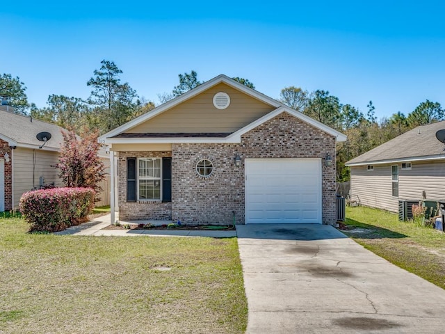 325 Chastain Ln, Tallahassee, FL 32305 - view of front of house featuring an attached garage, driveway, central AC unit, a front yard, and brick siding