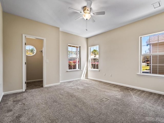 325 Chastain Ln, Tallahassee, FL 32305 - carpeted empty room featuring baseboards, visible vents, and a ceiling fan