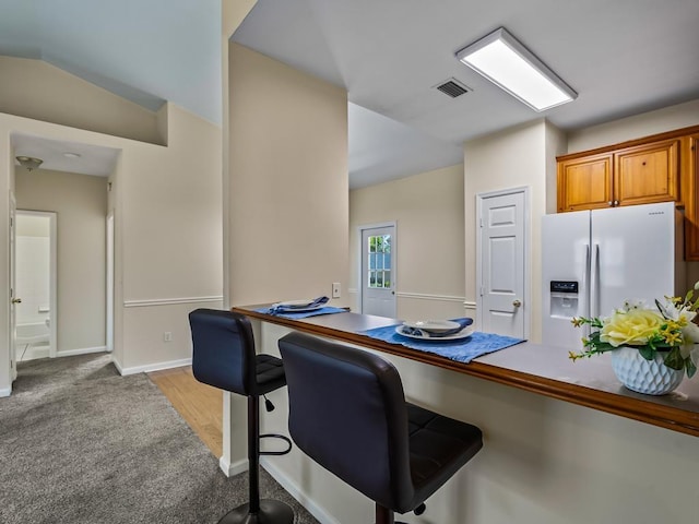 325 Chastain Ln, Tallahassee, FL 32305 - home office featuring baseboards, light colored carpet, and visible vents