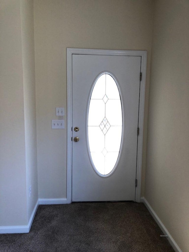 325 Chastain Ln, Tallahassee, FL 32305 - entryway with baseboards and dark colored carpet
