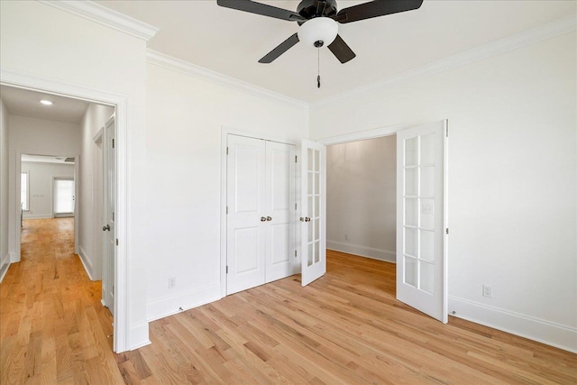 3833 Ardmore Ln, Tallahassee, FL 32308 - unfurnished bedroom featuring french doors, baseboards, light wood-style floors, and crown molding