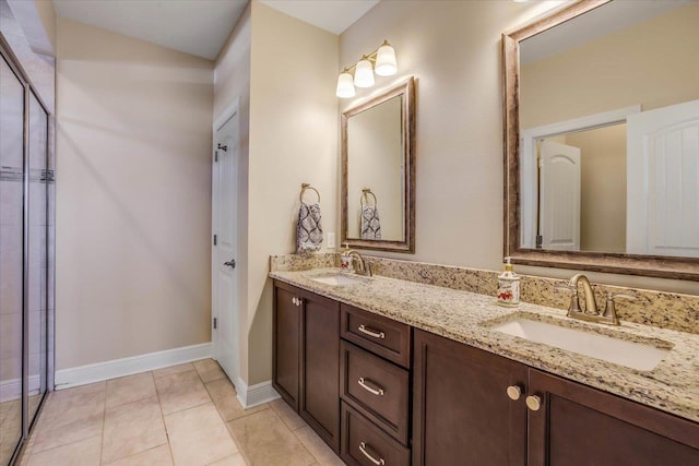 bathroom featuring vanity and tile patterned flooring