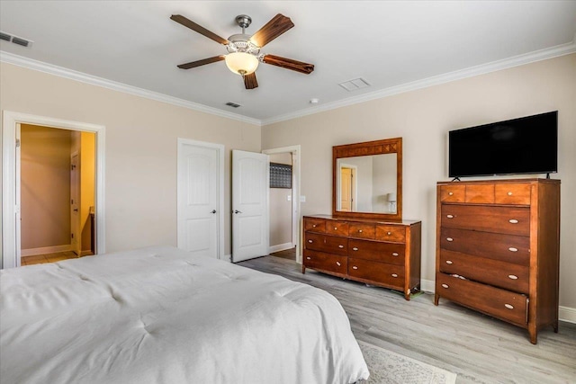 bedroom with ceiling fan, ornamental molding, and light wood-type flooring