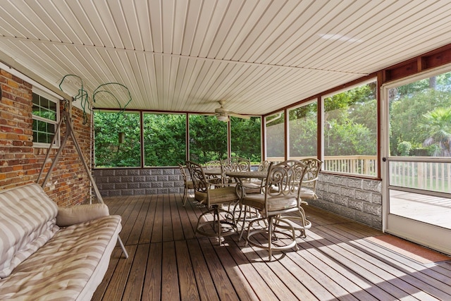 sunroom featuring wooden ceiling