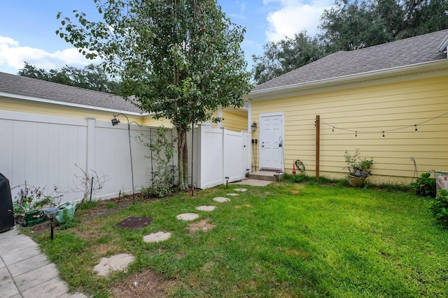 view of yard featuring fence