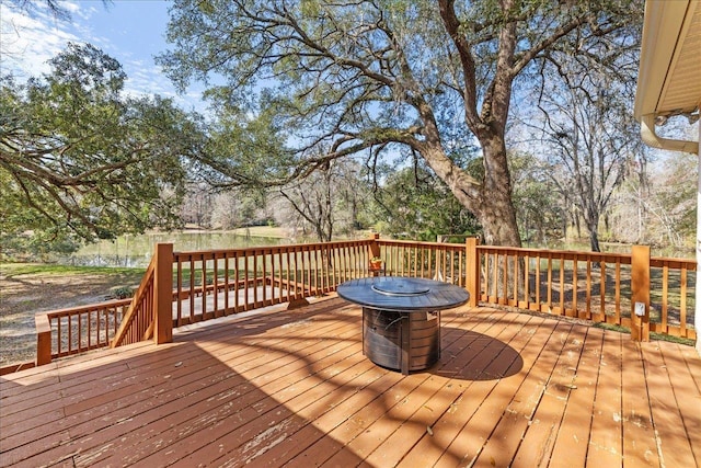 deck featuring a fire pit