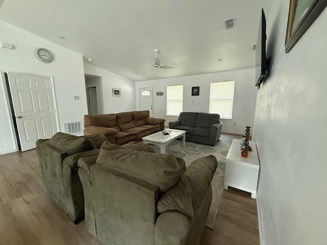 2754 Roberts Ave, Tallahassee, FL 32310 - living area with vaulted ceiling, wood finished floors, and visible vents