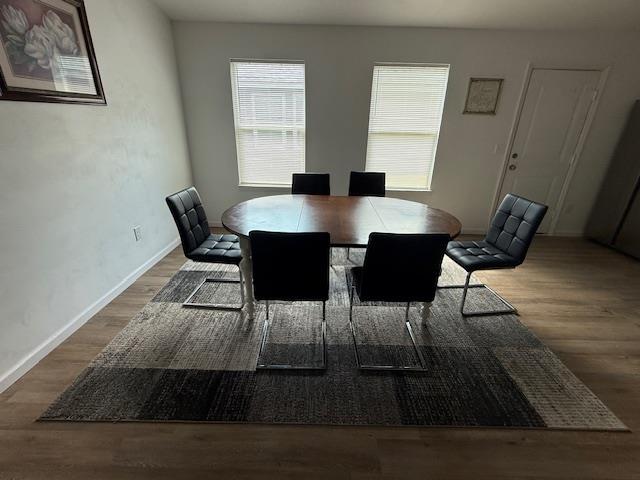 2754 Roberts Ave, Tallahassee, FL 32310 - dining space featuring baseboards and wood finished floors