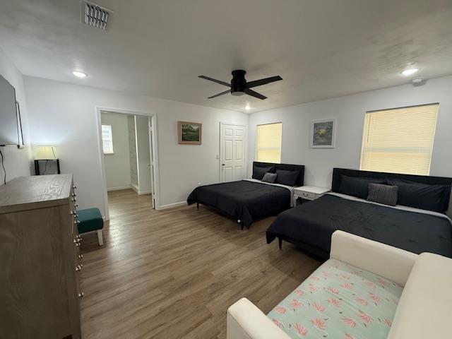 2754 Roberts Ave, Tallahassee, FL 32310 - bedroom featuring wood finished floors, visible vents, baseboards, and ceiling fan