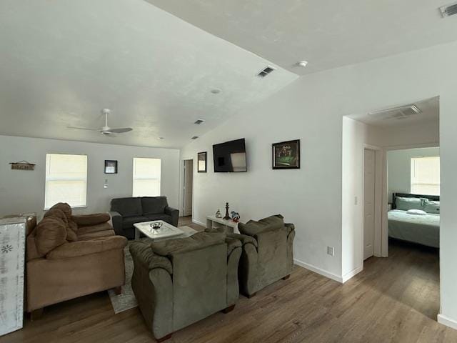 2754 Roberts Ave, Tallahassee, FL 32310 - living room featuring vaulted ceiling, wood finished floors, visible vents, baseboards, and ceiling fan
