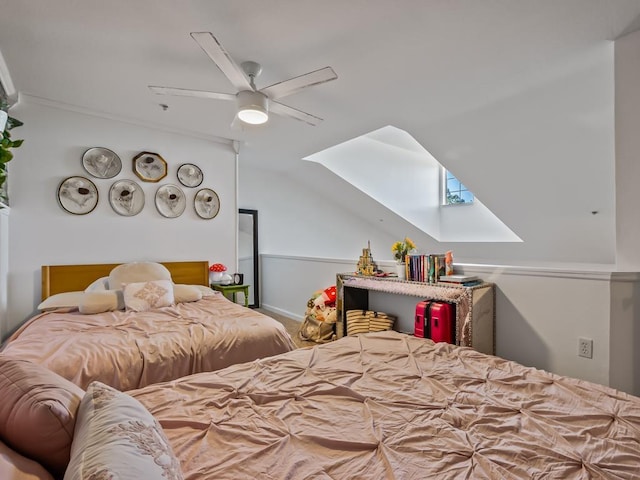 bedroom featuring ceiling fan and vaulted ceiling