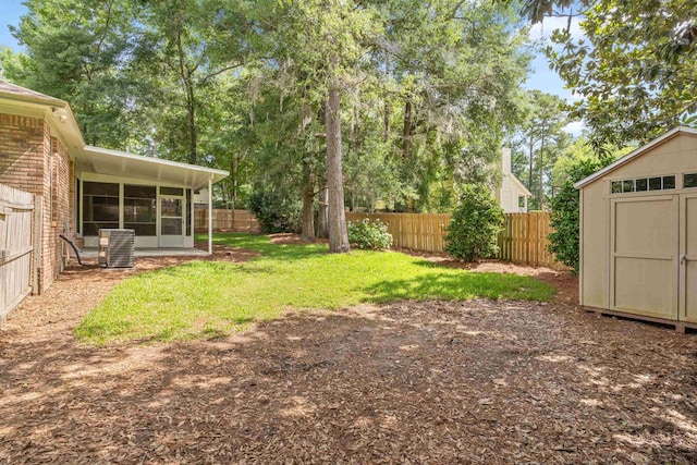 3585 Gardenview Way, Tallahassee, FL 32309 - fenced backyard with a sunroom and a storage shed
