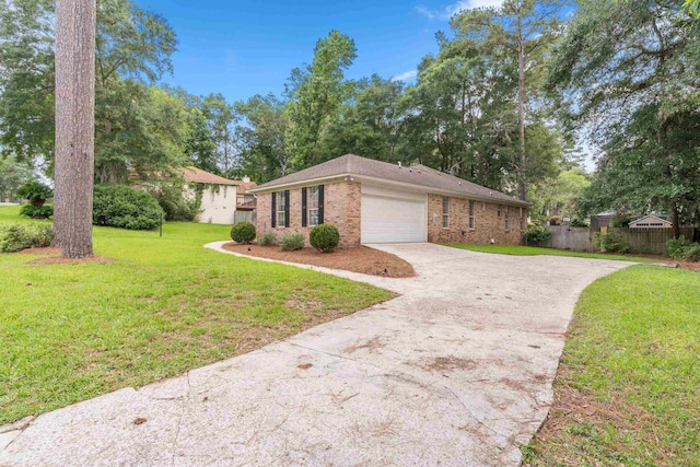 3585 Gardenview Way, Tallahassee, FL 32309 - single story home featuring brick siding, an attached garage, and concrete driveway