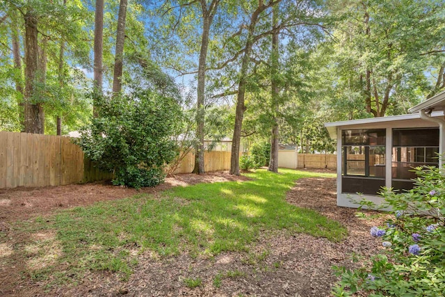 3585 Gardenview Way, Tallahassee, FL 32309 - fenced backyard with a sunroom
