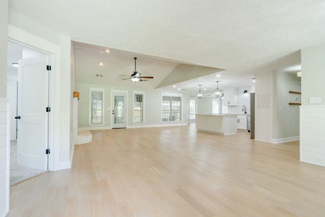 3585 Gardenview Way, Tallahassee, FL 32309 - unfurnished living room with a ceiling fan, light wood finished floors, and recessed lighting