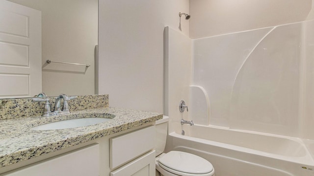 full bathroom featuring toilet, shower / bath combination, and vanity