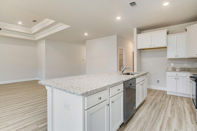 kitchen with sink, an island with sink, dishwasher, and a raised ceiling