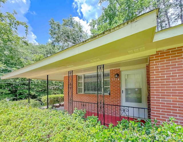 1514 Sharon Rd, Tallahassee, FL 32303 - view of home's exterior with brick siding and covered porch