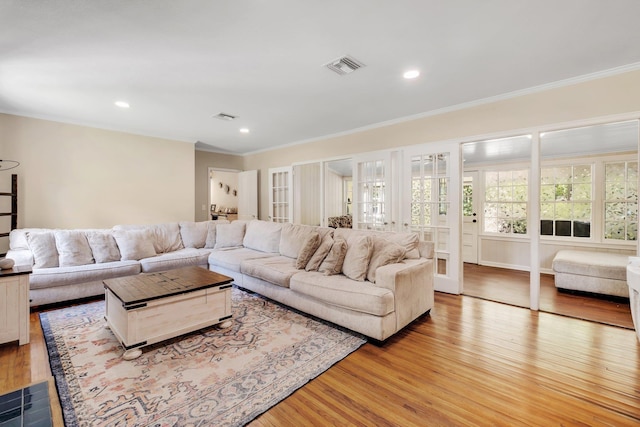 705 N 11th St, Quincy, FL 32351 - living area featuring crown molding, light wood-type flooring, and recessed lighting