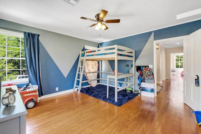 705 N 11th St, Quincy, FL 32351 - bedroom featuring wood finished floors and baseboards