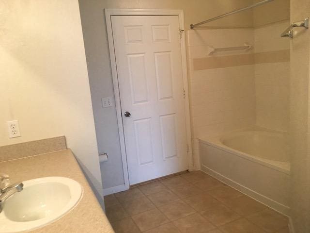 bathroom featuring vanity and shower / bathtub combination