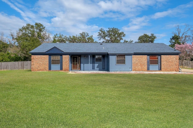 view of front facade with covered porch and a front lawn